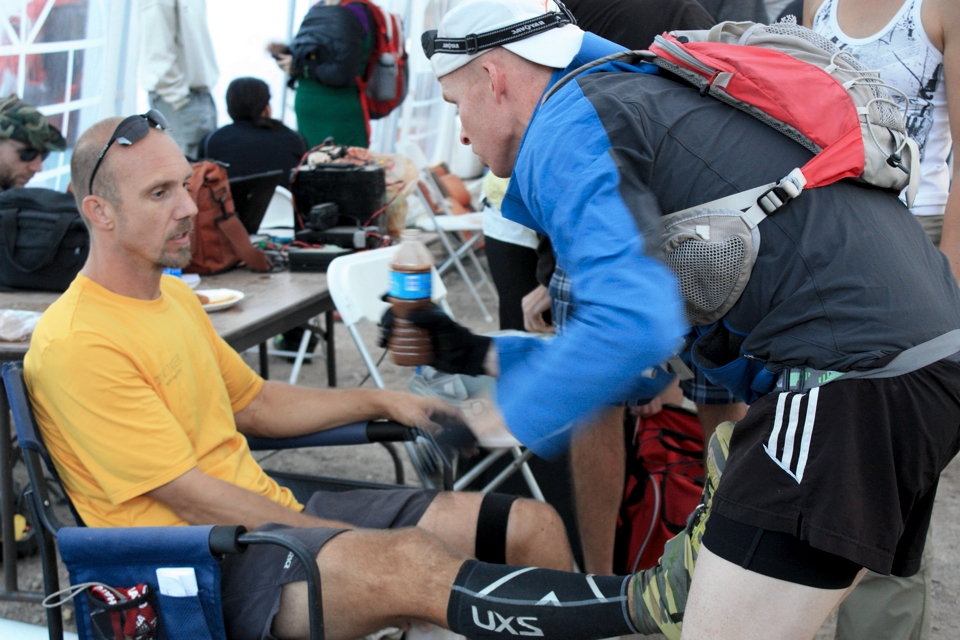picture of mark kreuzer at the wasatch 100 getting support from his crew