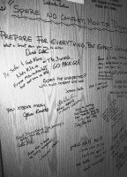 Signatures and words of inspiration cover the cabinets inside the RV.